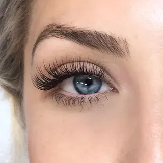 Classic lash extensions, one extension per natural lash, close-up