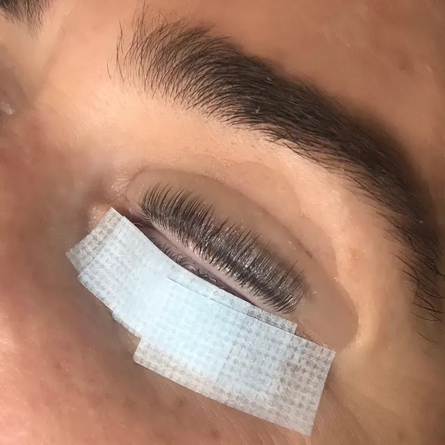 YUMI lash lift result: natural lashes lifted, close-up